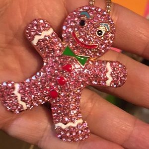 Pink gingerbread man necklace/pin